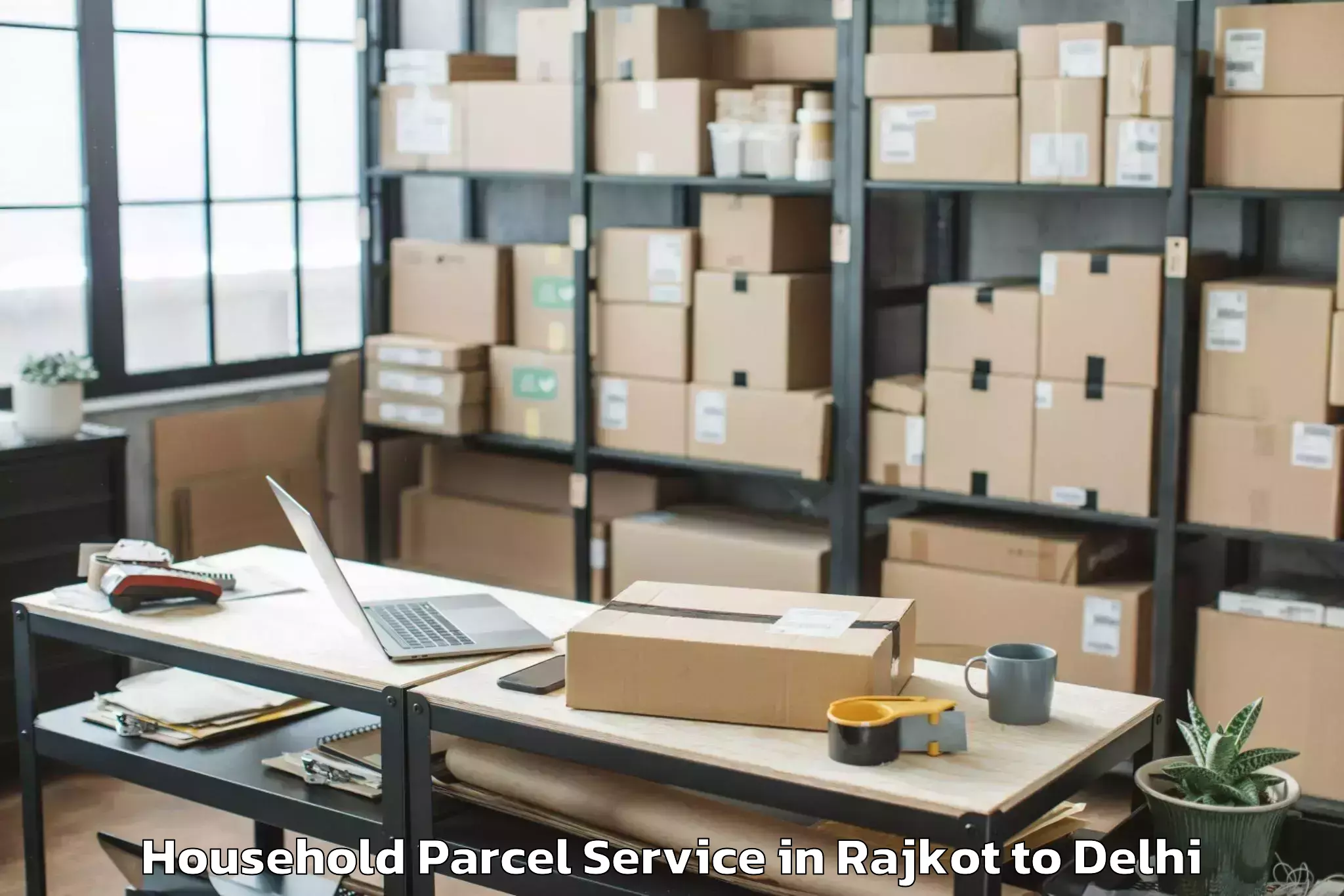 Get Rajkot to Flatted Factory Complex Okhla Household Parcel